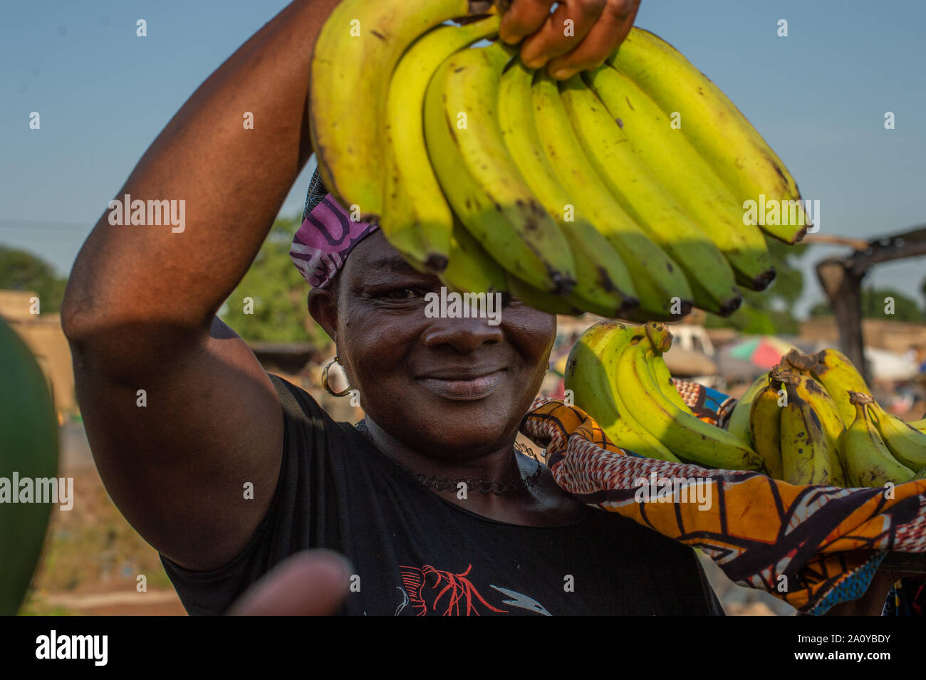 Woman sells banana fruit in the Ougadoungou streets, Burkina Faso, Africa Stock Photo