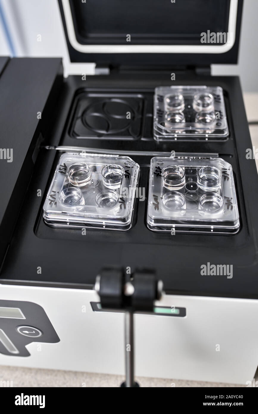 Modern IVF incubator with opened cover in the laboratory of the in