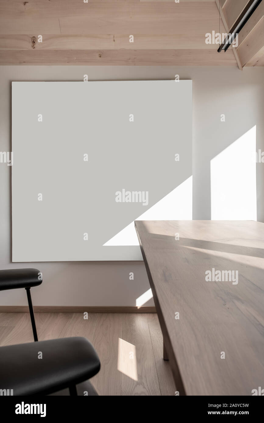 Modern Interior With A Sloping Wooden Ceiling And White