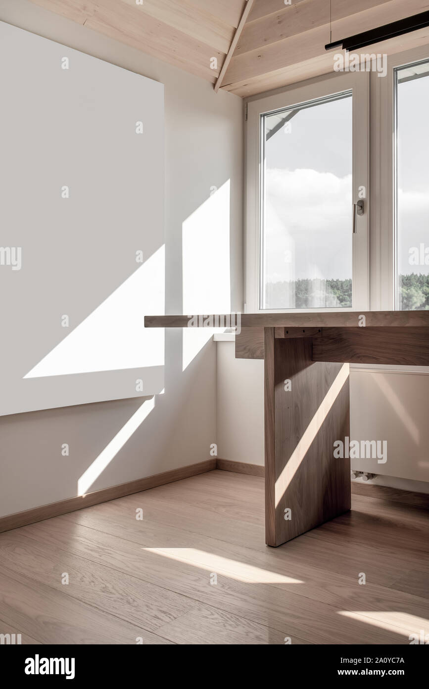 Stylish Modern Interior With A Sloping Wooden Ceiling And