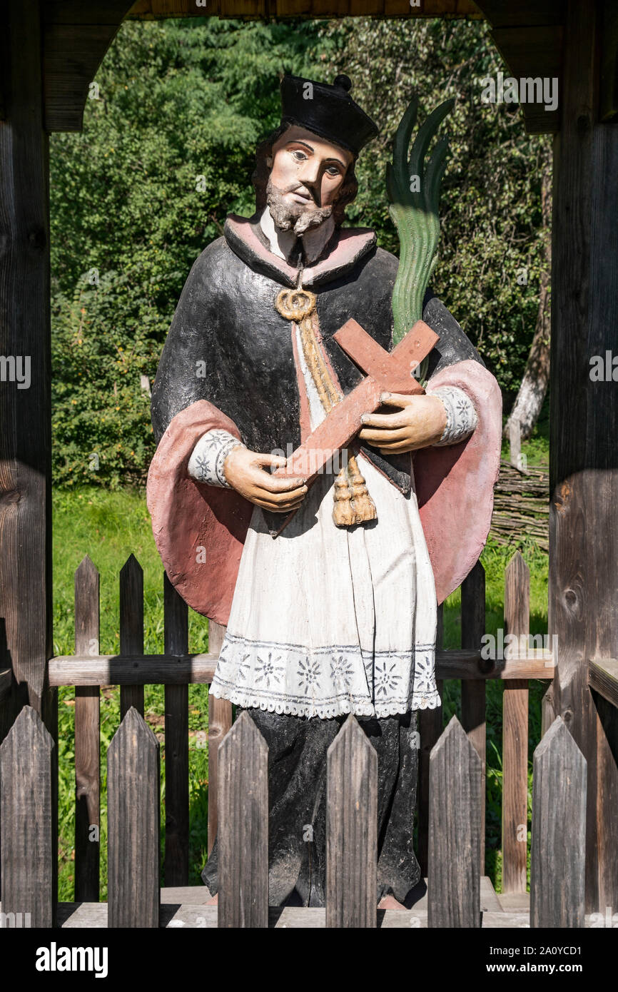 Sculpture of Saint Florian in wooden chapel in open air museum in Sanok, Poland. Stock Photo