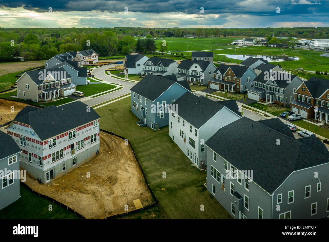 Aerial view of typical American new construction neighborhood street in Maryland for the upper middle class, single family homes USA real estate Stock Photo
