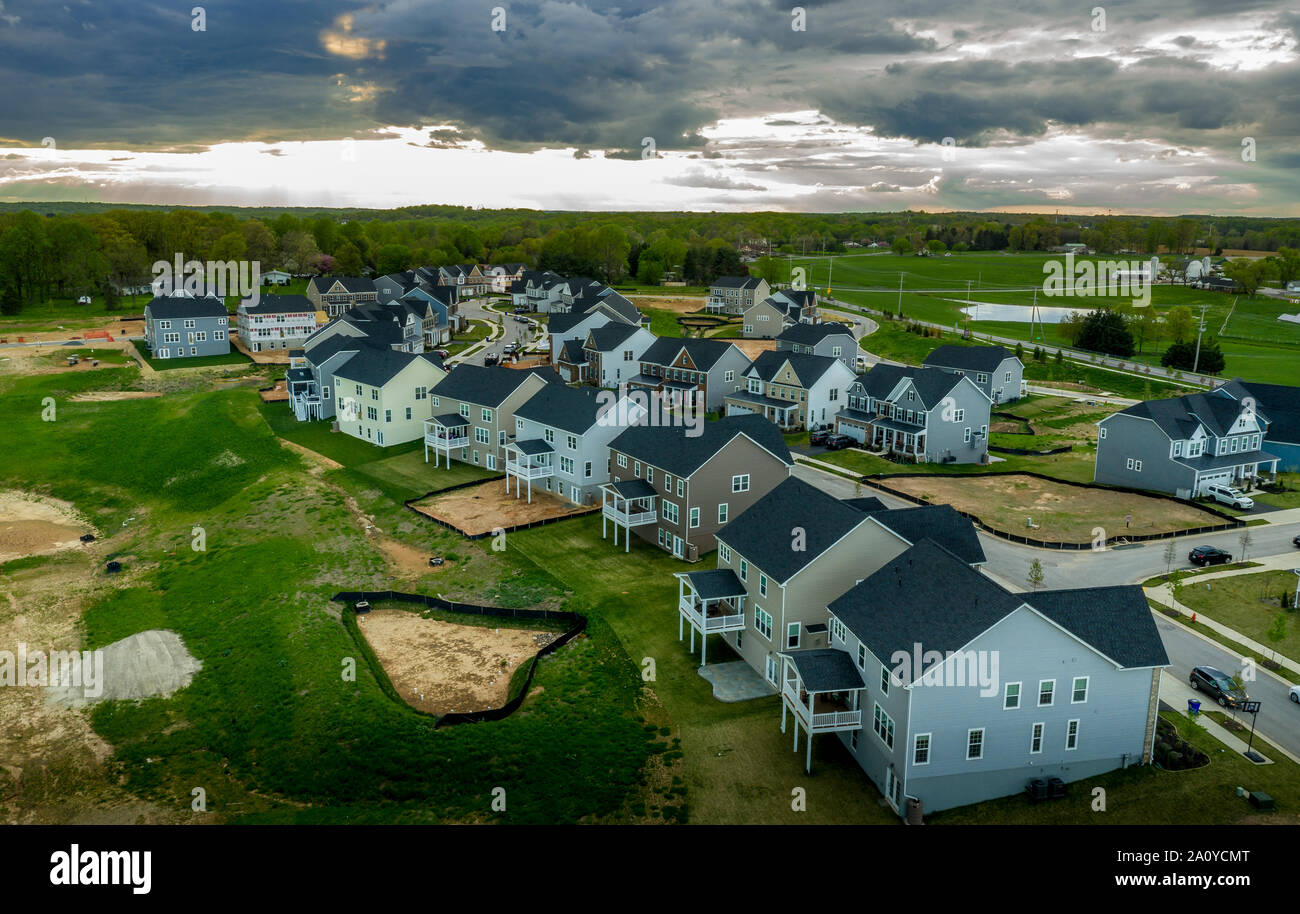Aerial view of typical American new construction neighborhood street in