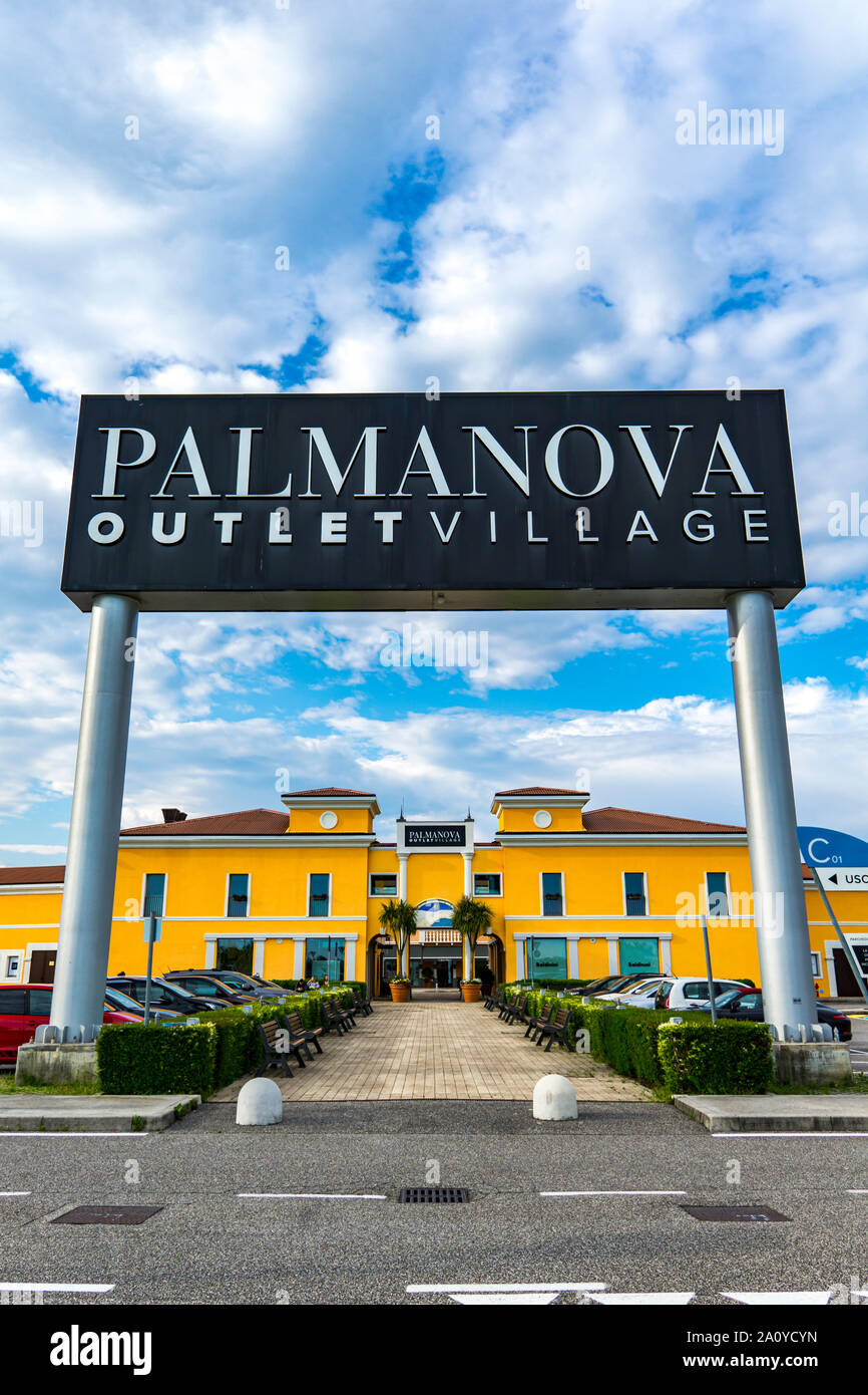 PALMANOVA, ITALY - MAY 23, 2019: Entrance at Palmanova Outlet Village in  Italy. Village was opened in 2008 and hosts over 90 retailers Stock Photo -  Alamy