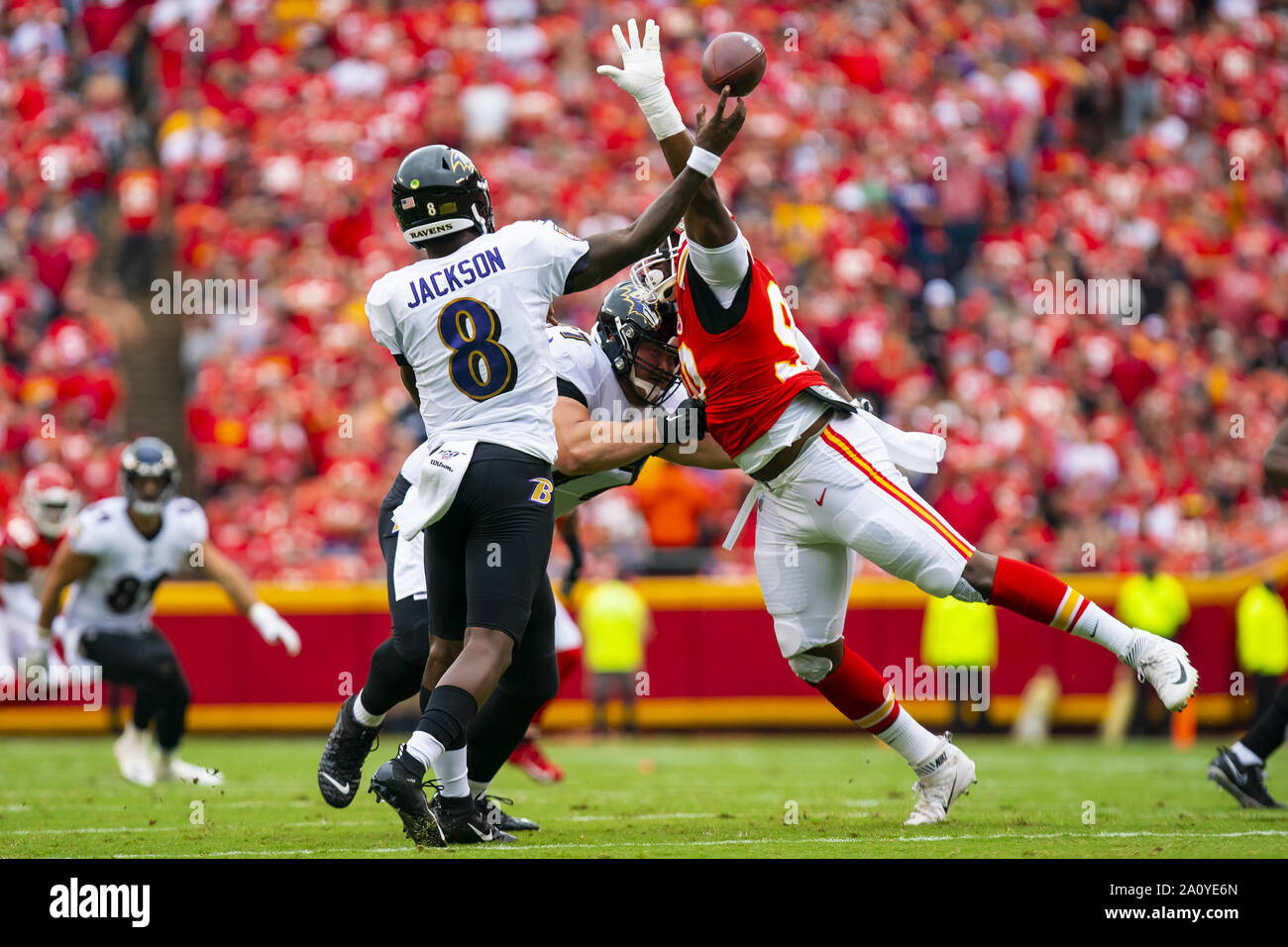 Kansas City, USA. 22nd Sep, 2019. Kansas City Chiefs defensive end Emmanuel Ogbah (90) attempts to knock down the pass from Baltimore Ravens quarterback Lamar Jackson (8) in the second quarter at Arrowhead Stadium in Kansas City, Missouri on Sunday, September 22, 2019. Photo by Kyle Rivas/UPI Credit: UPI/Alamy Live News Stock Photo