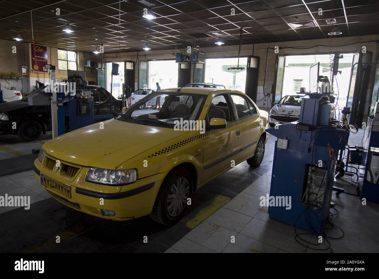 Tehran, Iran. 22nd Sep, 2019. Employees of Seraj vehicle Technical  Inspection Center check cars in the