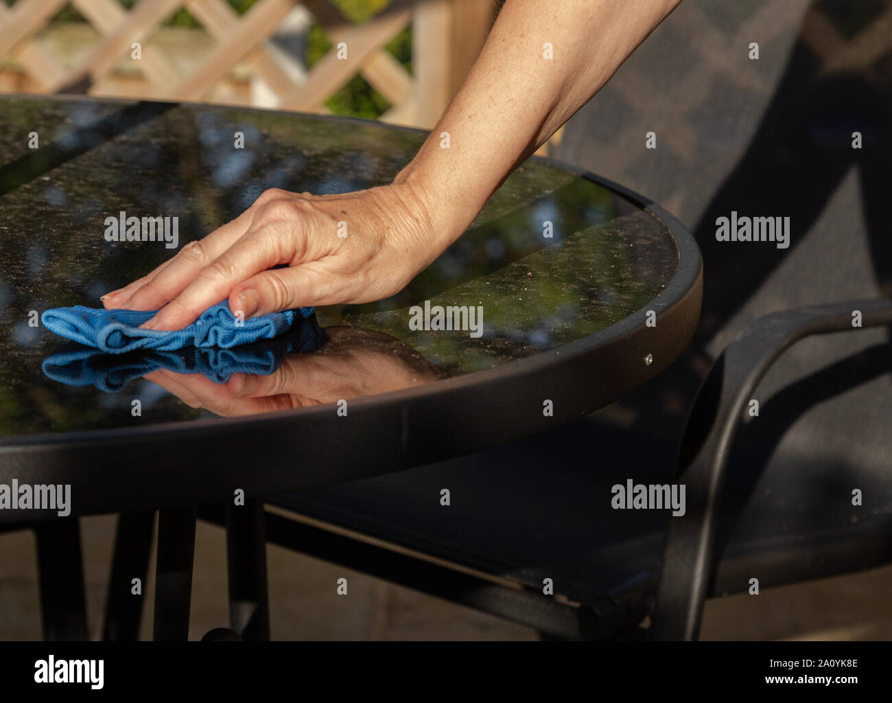 Cleaning garden furniture Stock Photo Alamy