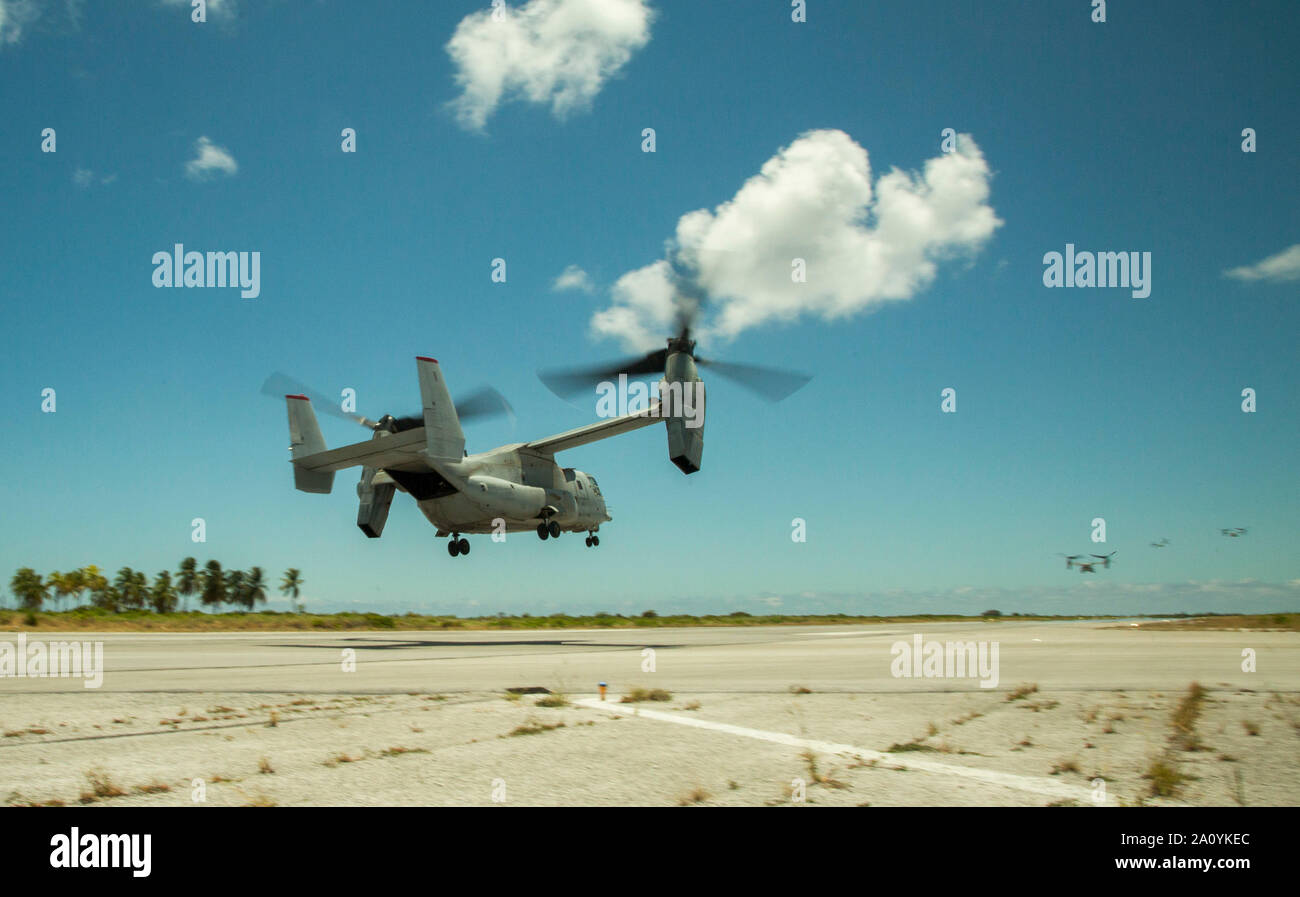 MV-22 Ospreys takeoff during the Marine Rotational Force - Darwin trans-Pacific flight, Cassidy International Airport, Kiribati, Sep. 20, 2019. The flight was conducted to improve upon the Osprey trans-Pacific concept that has been developed and refined over the past three MRF-D iterations. (U.S. Marine Corps photo by 1st Lt. Colin Kennard) Stock Photo
