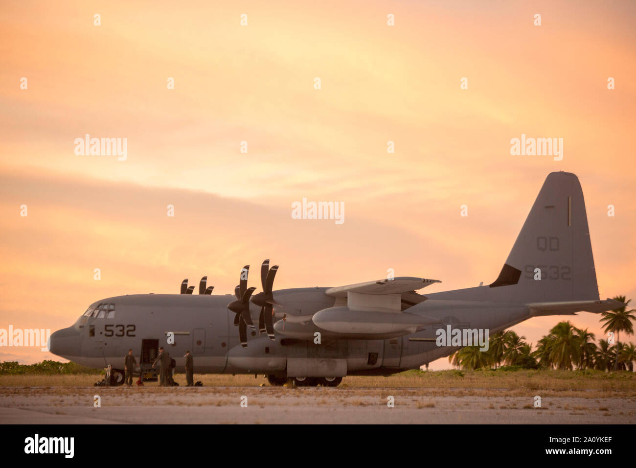 U.S. Marines debark a KC-130J Hercules during the Marine Rotational Force - Darwin trans-Pacific flight, Cassidy International Airport, Kiribati, Sep. 19, 2019. The flight was conducted to improve upon the Osprey trans-Pacific concept that has been developed and refined over the past three MRF-D iterations. (U.S. Marine Corps photo by 1st Lt. Colin Kennard) Stock Photo