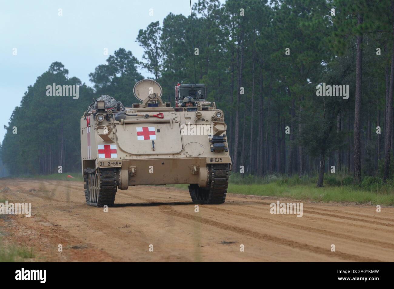Combat medics from the 2nd Battalion, 69th Armored Regiment, 2nd Armored Brigade Combat Team, 3rd Infantry Division, maneuver an M113 Armored Personnel Carrier through a trauma lane training exercise at Fort Stewart, Ga., Sep. 18, 2019. The training exercise is designed to test Soldier skills and knowledge on 9-Line MEDEVAC radio operations, and battlefield trauma casualty care in preparation for Panther Focus. (U.S. Army photo by Sgt. Andres Chandler/released) #Readynow #Sendme #ROTM Stock Photo