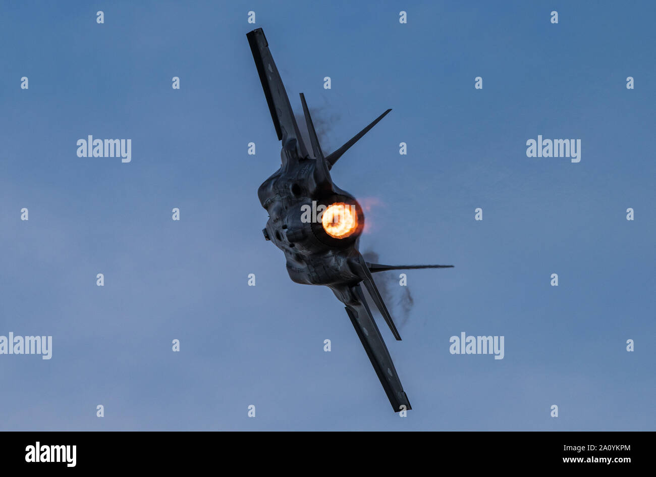Capt. Andrew 'Dojo' Olson, F-35 Demonstration Team pilot and commander performs aerial maneuvers during a twilight performance at the Oregon International Airshow in McMinnville, OR, Sept. 20, 2019. The demo features 14 maneuvers which showcase the Air Force's newest fifth-generation fighter aircraft. (U.S. Air Force photo by Senior Airman Alexander Cook) Stock Photo