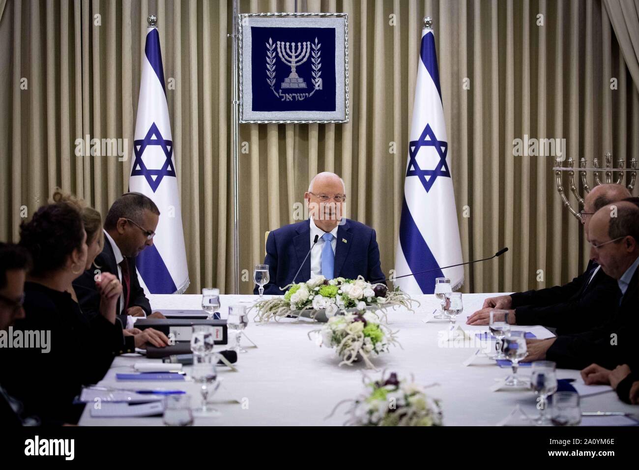 (190922) -- JERUSALEM, Sept. 22, 2019 (Xinhua) -- Israeli President Reuven Rivlin (C) meets with members of the Blue and White party at the President's Residence in Jerusalem, on Sept. 22, 2019. Israeli President Reuven Rivlin began on Sunday consultations with all elected parties before he decides the person who will be tasked with forming Israel's next government amid post-election political stalemate. (Yonatan Sindel/JINI via Xinhua) Stock Photo