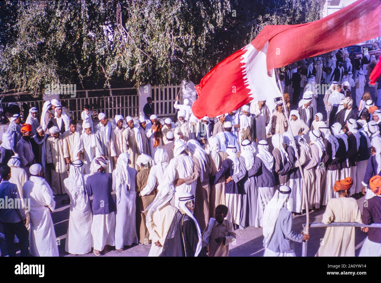 Arab men celebrating the end of Ramadan in Bahrain 1962.  Ramadan is the ninth month of the Islamic calender, observed by Muslims worldwide as a month of fasting, prayer and reflection. Stock Photo