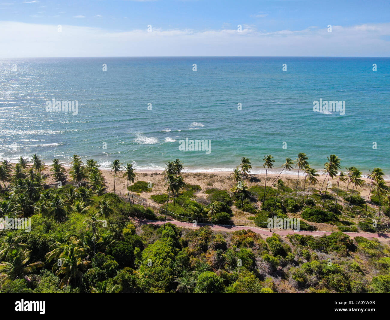 Aerial view of tropical beach and turquoise clear sea water with small ...