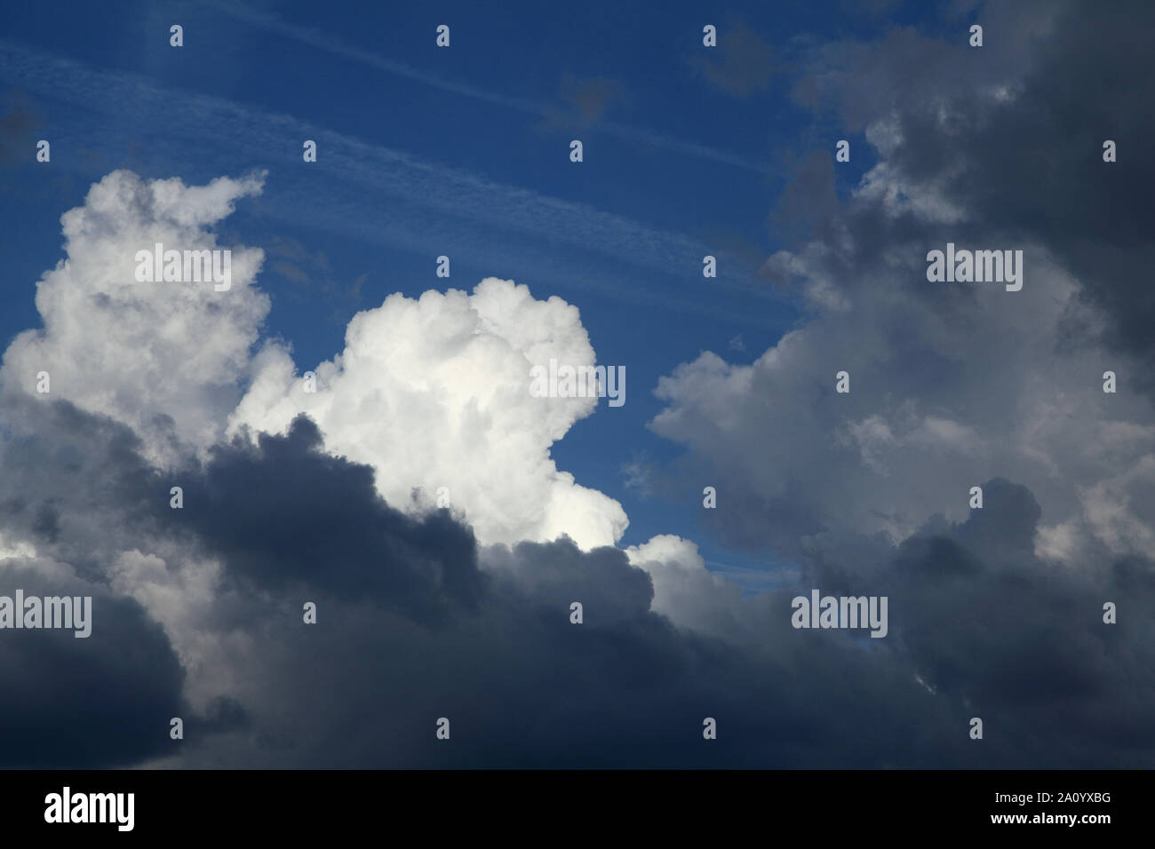 White, grey, dark, cloud, clouds, turbulent, turbulence, blue sky, weather Stock Photo