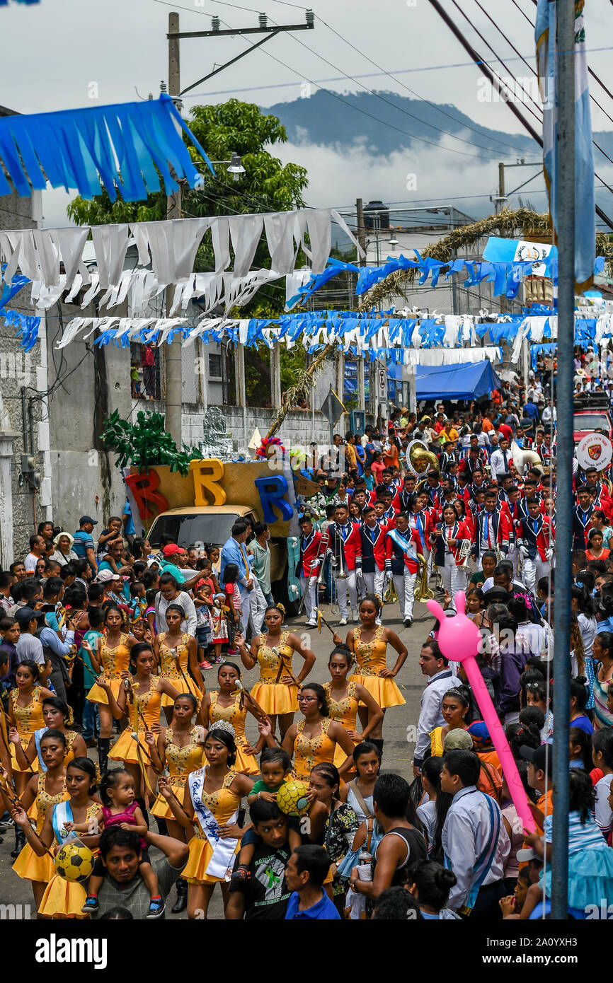 latin people walking in Guatemalan independence day parade Stock Photo