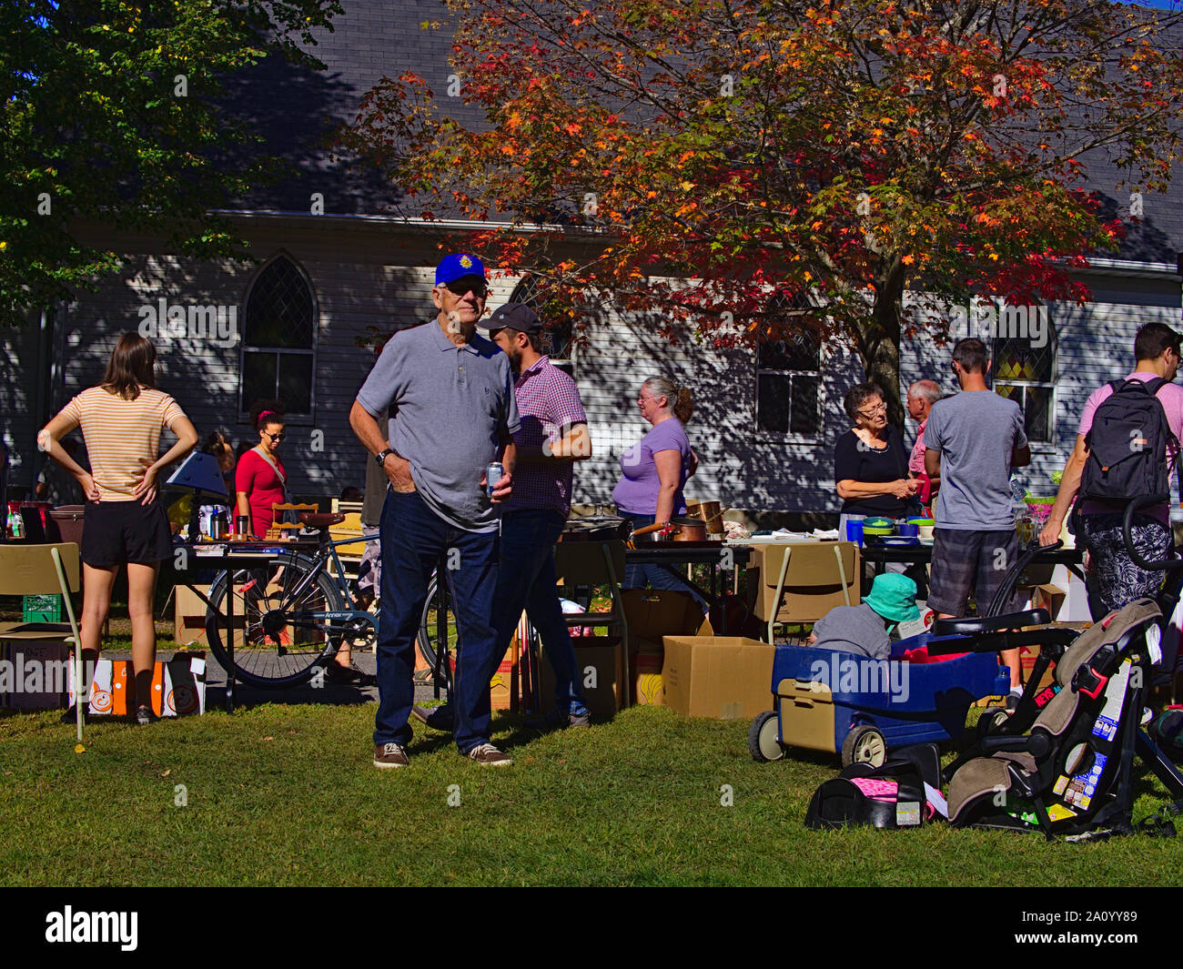 People Browsing Stalls In The Church Quad At The New Edinburgh