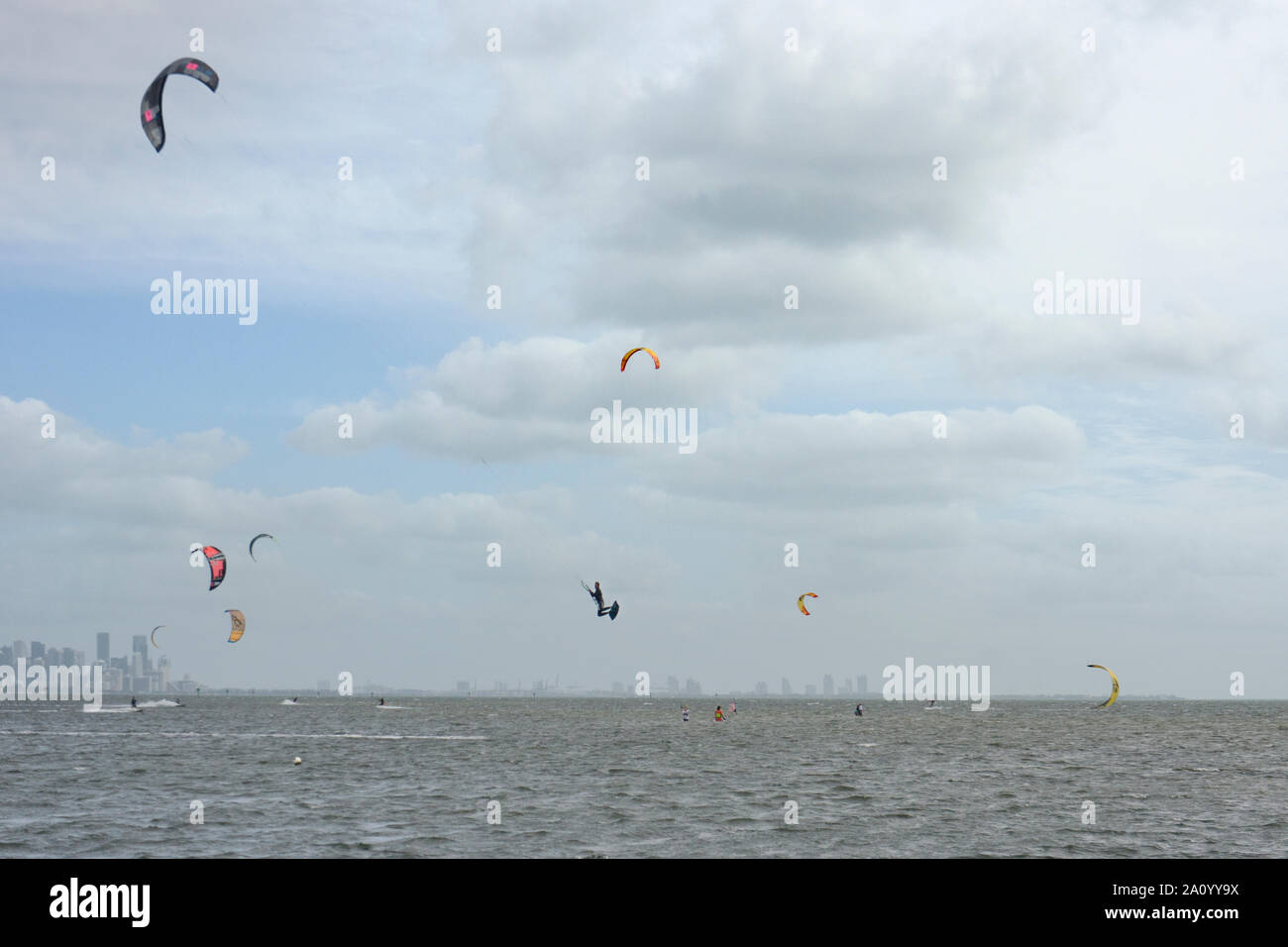 Biscayne Bay on a windy Sunday morning  with many kiteboarders enjoying the weather as seen from Matheson Hammock Park Stock Photo
