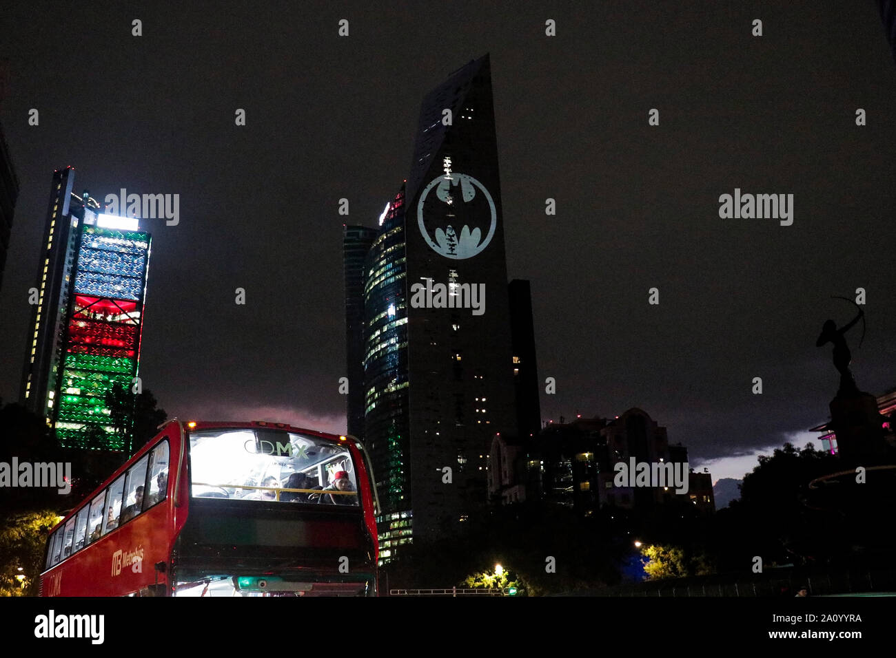View of the Batman's symbol projected on the Reforma Tower, fans ...