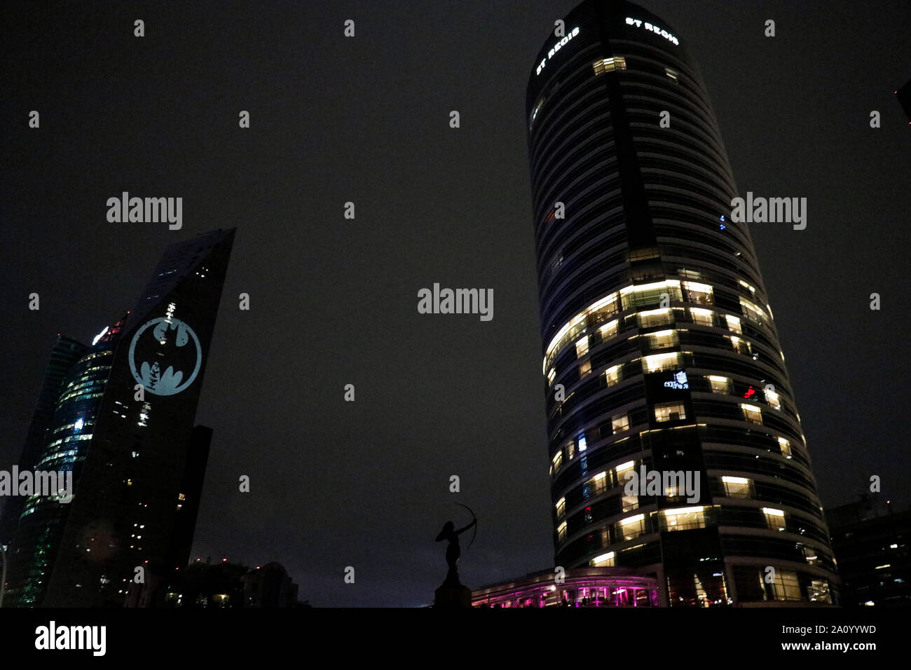 View of the Batman's symbol projected on the Reforma Tower, fans ...