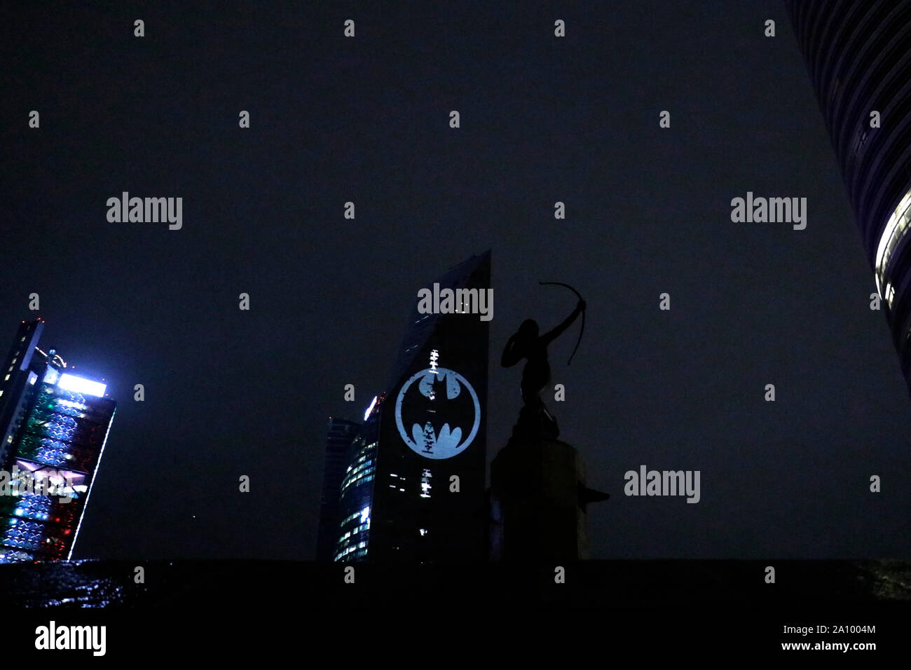 View of the Batman's symbol projected on the Reforma Tower, fans ...