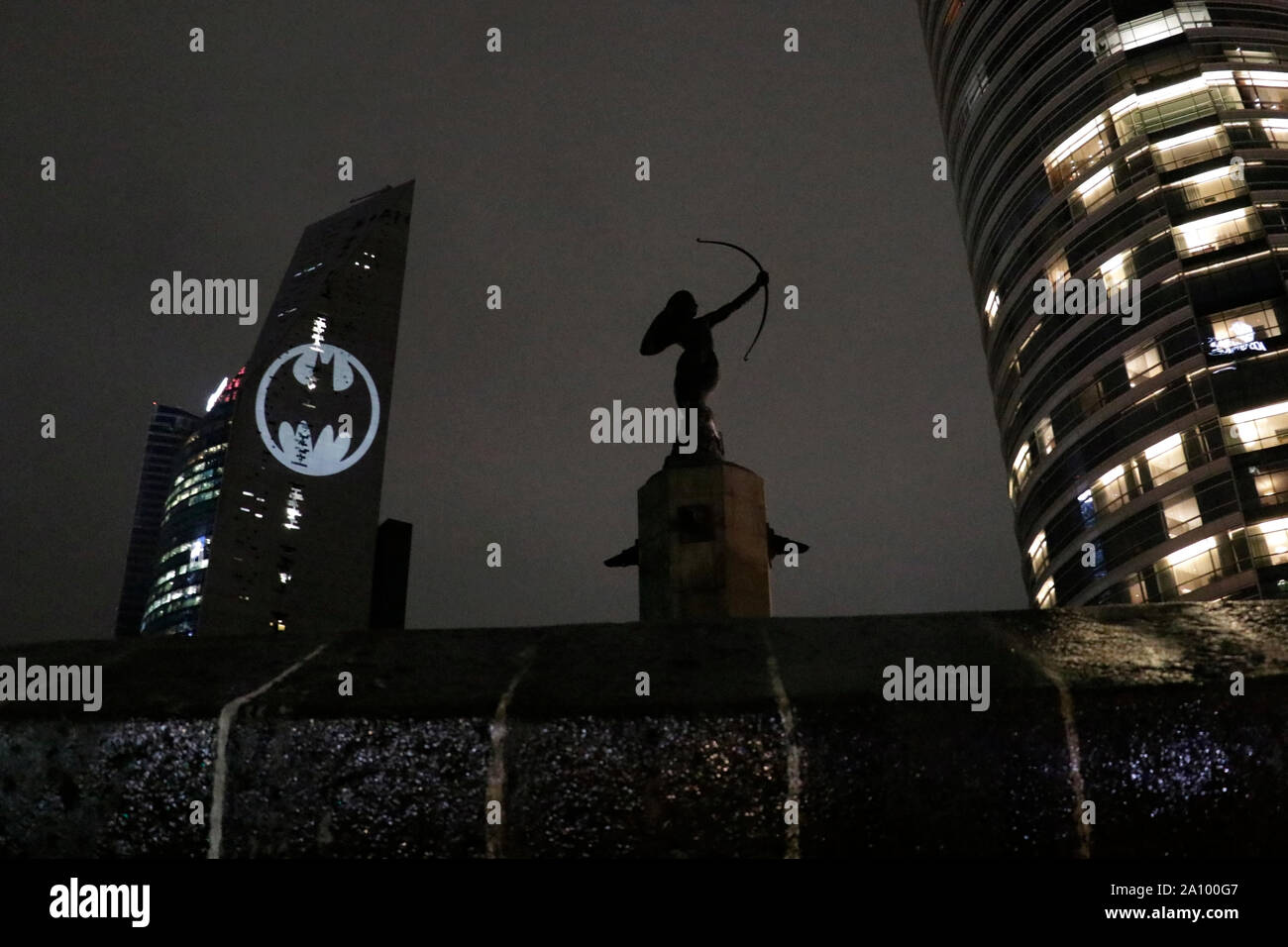 View of the Batman's symbol projected on the Reforma Tower, fans ...