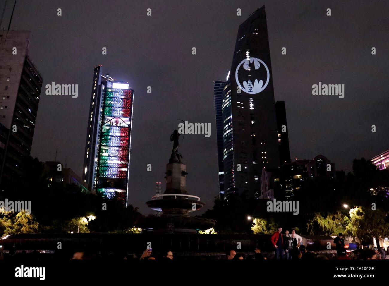 View of the Batman's symbol projected on the Reforma Tower, fans ...