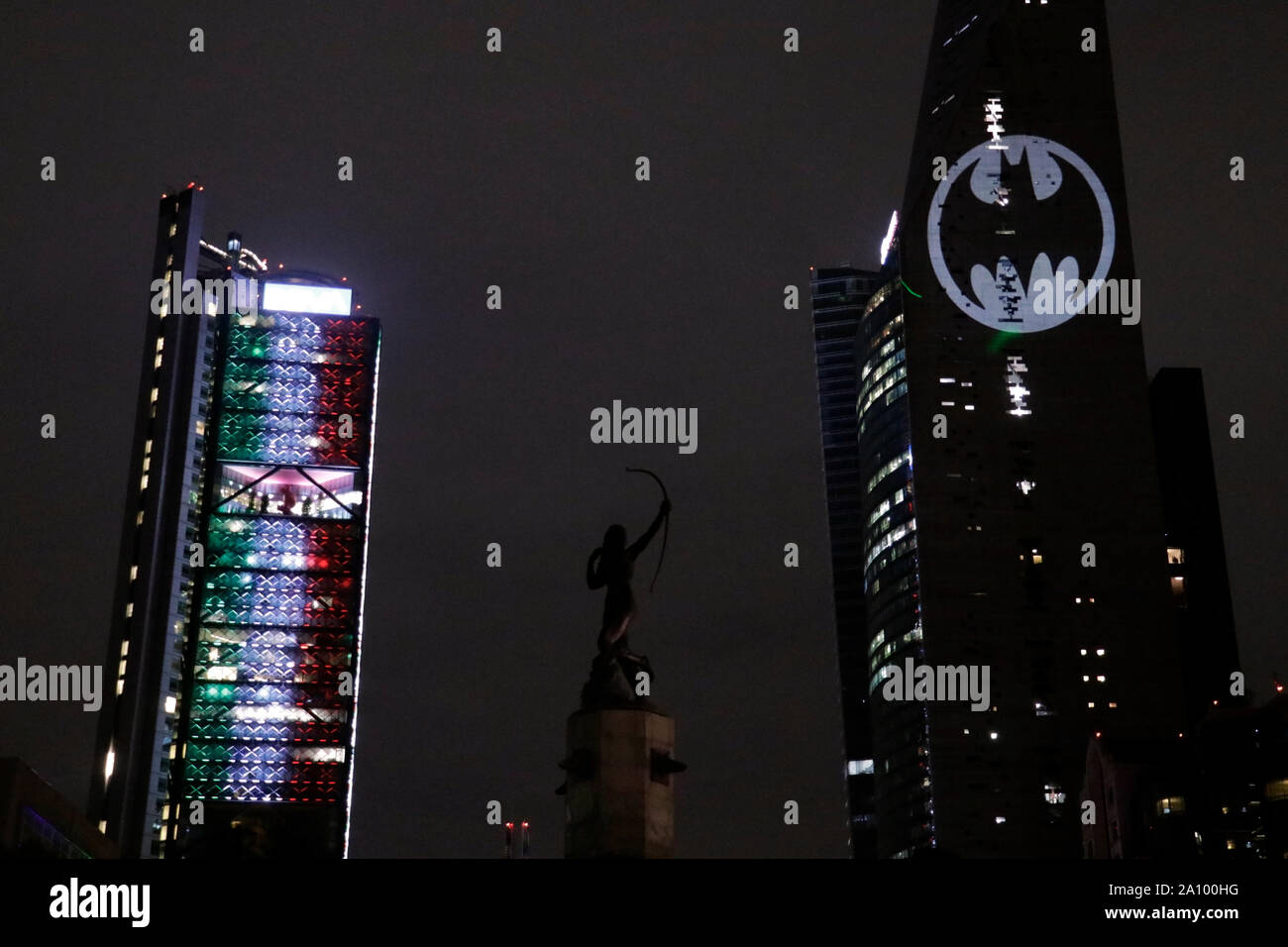 View of the Batman's symbol projected on the Reforma Tower, fans ...