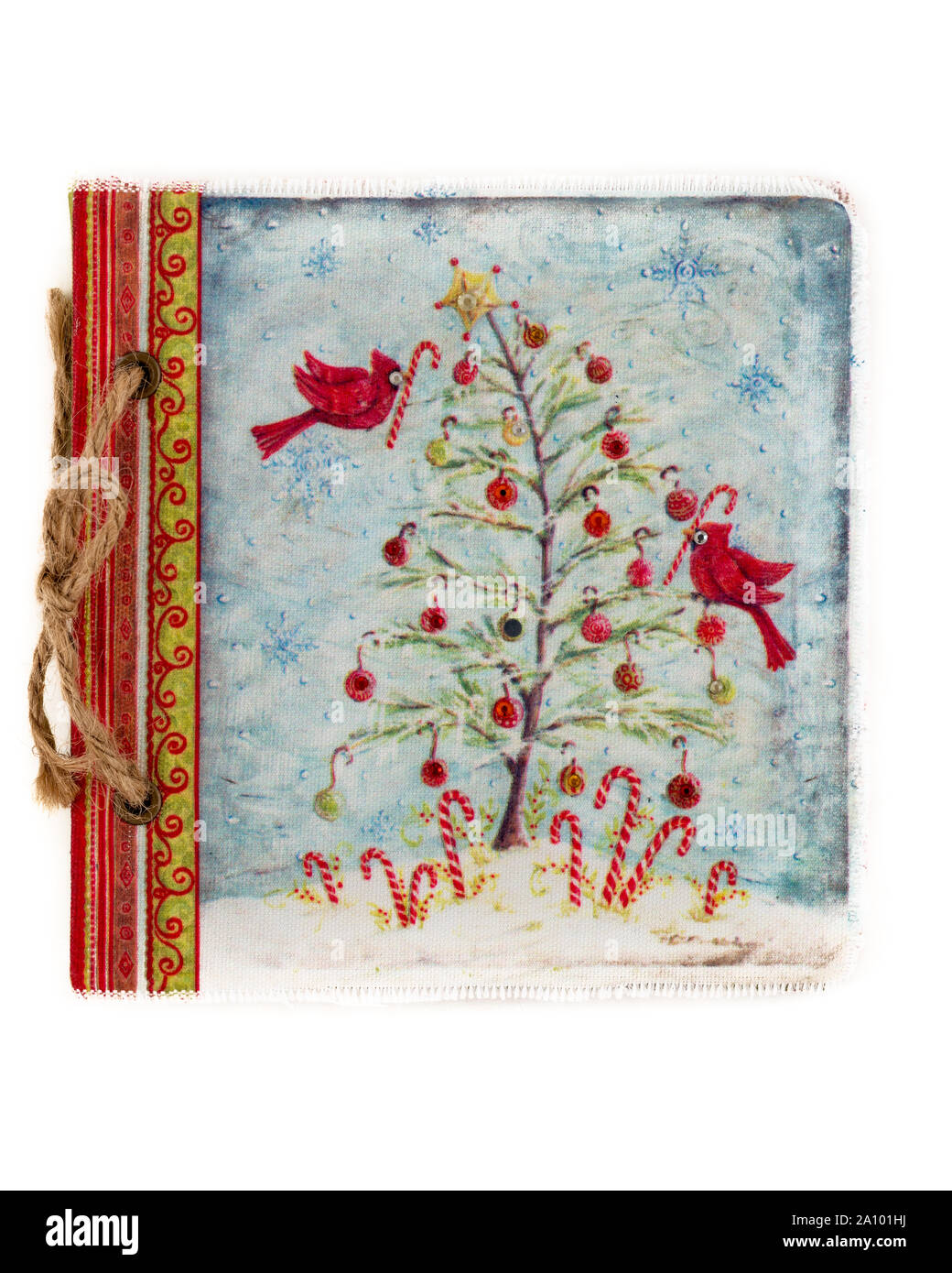 Vintage drawing book with Christmas tree design isolated on white. Stock Photo
