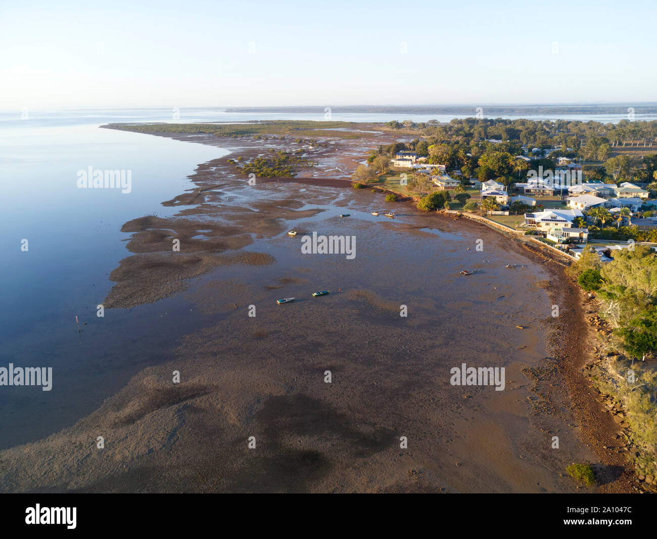 Early morning aerial of the coastal village of Boonooroo on the shores of the Great Sandy Strait opposite Fraser Island Queensland Australia Stock Photo