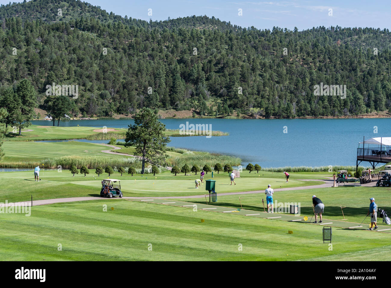 New Mexico golf course driving range and putting practice at the Mescalero Apache Inn of the Mountain Gods Resort and Casino, Ruidoso, NM, USA. Stock Photo