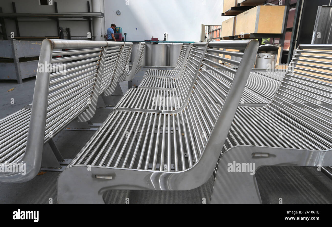 18 September 2019, Bavaria, Königsberg In Bayern: Bench elements made of metal are located in a production hall of Benkert Bänke. The company from Lower Franconia manufactures benches and ships them all over the world - from Los Angeles to Hong Kong. Photo: Karl-Josef Hildenbrand/dpa Stock Photo