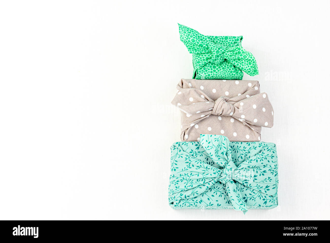 Fabric wrapped gifts, reusable sustainable gift wrapping alternative