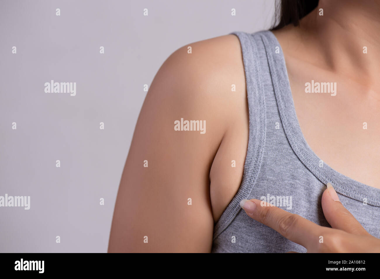 Close up woman pointing her skin underarm. problem armpit fat skin concept  Stock Photo - Alamy