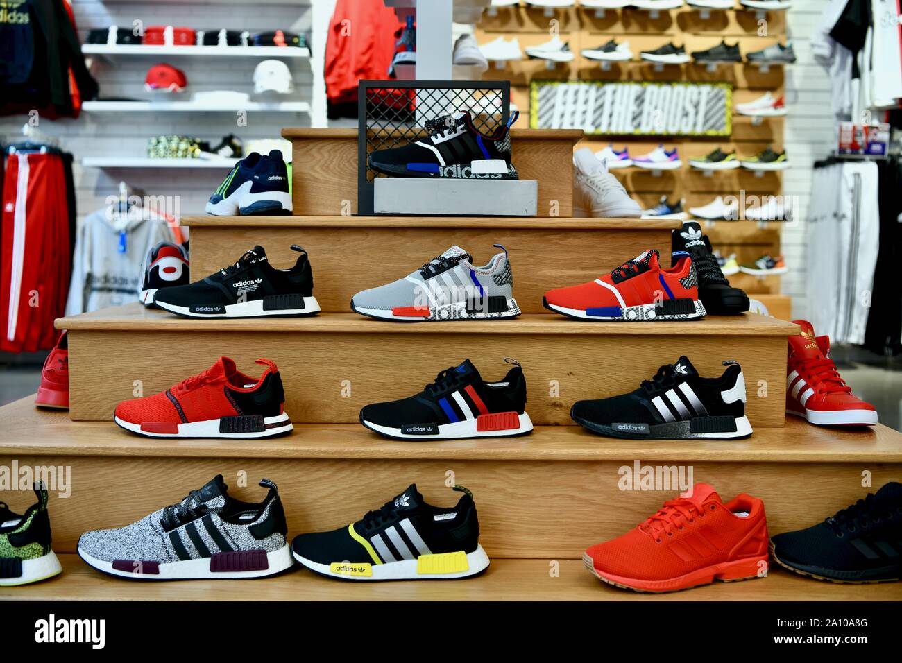 Adidas shoes in the flagship Adidas store in New York City, USA Stock Photo