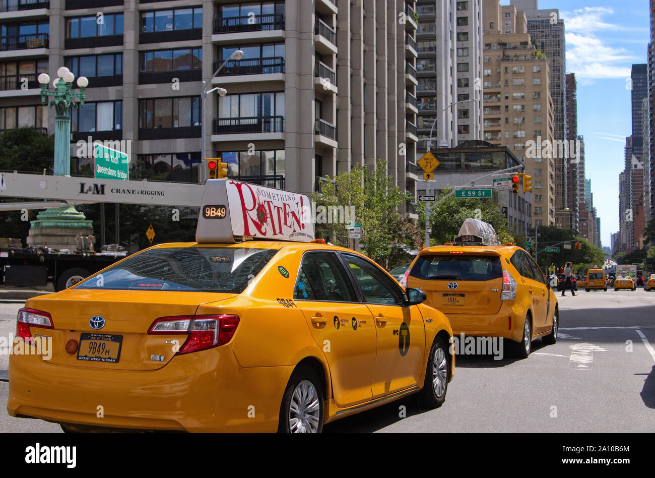 New York, NY USA. Aug 2015. The signs, yellow taxicabs, attractions, traffic, and just getting around experiencing The Big Apple. Stock Photo