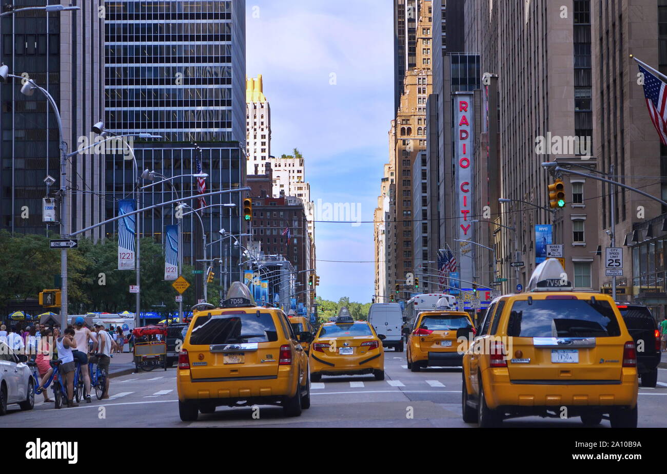New York, NY USA. Aug 2015. The signs, yellow taxicabs, attractions, traffic, and just getting around experiencing The Big Apple. Stock Photo