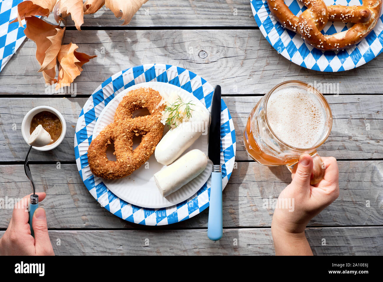 Oktoberfest Traditional Food Flat Lay On Wooden Table With Blue