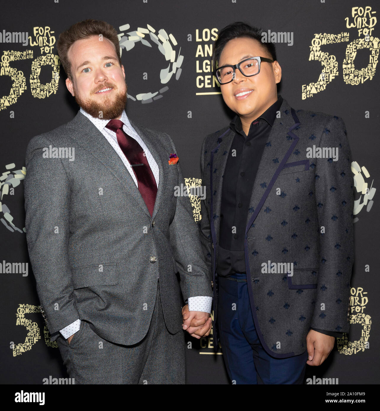 Los Angeles, CA - Sept 21, 2019: Zeke Smith and Nico Santos attend the Los Angeles LGBT Center's Gold Anniversary Vanguard Celebration 'Hearts Of Gold Stock Photo