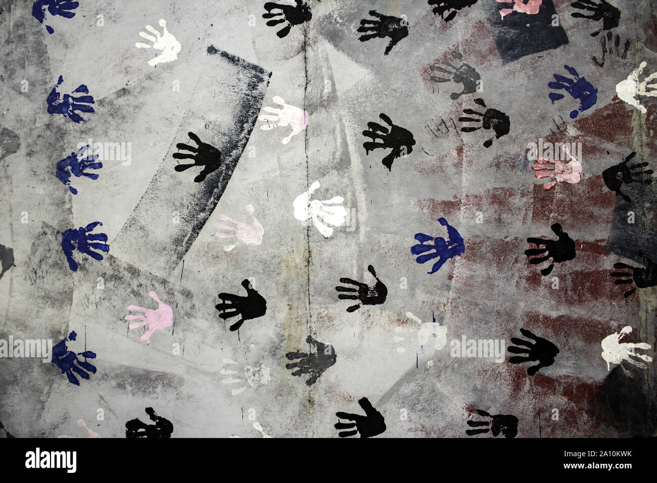 Footprints hand painted on wall, human symbol, peace Stock Photo