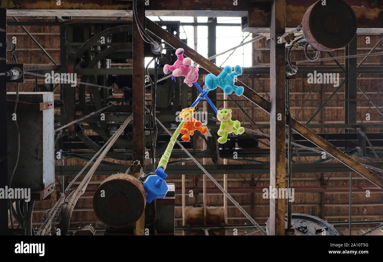 Still life of vintage baby mobile with colorful moving animals