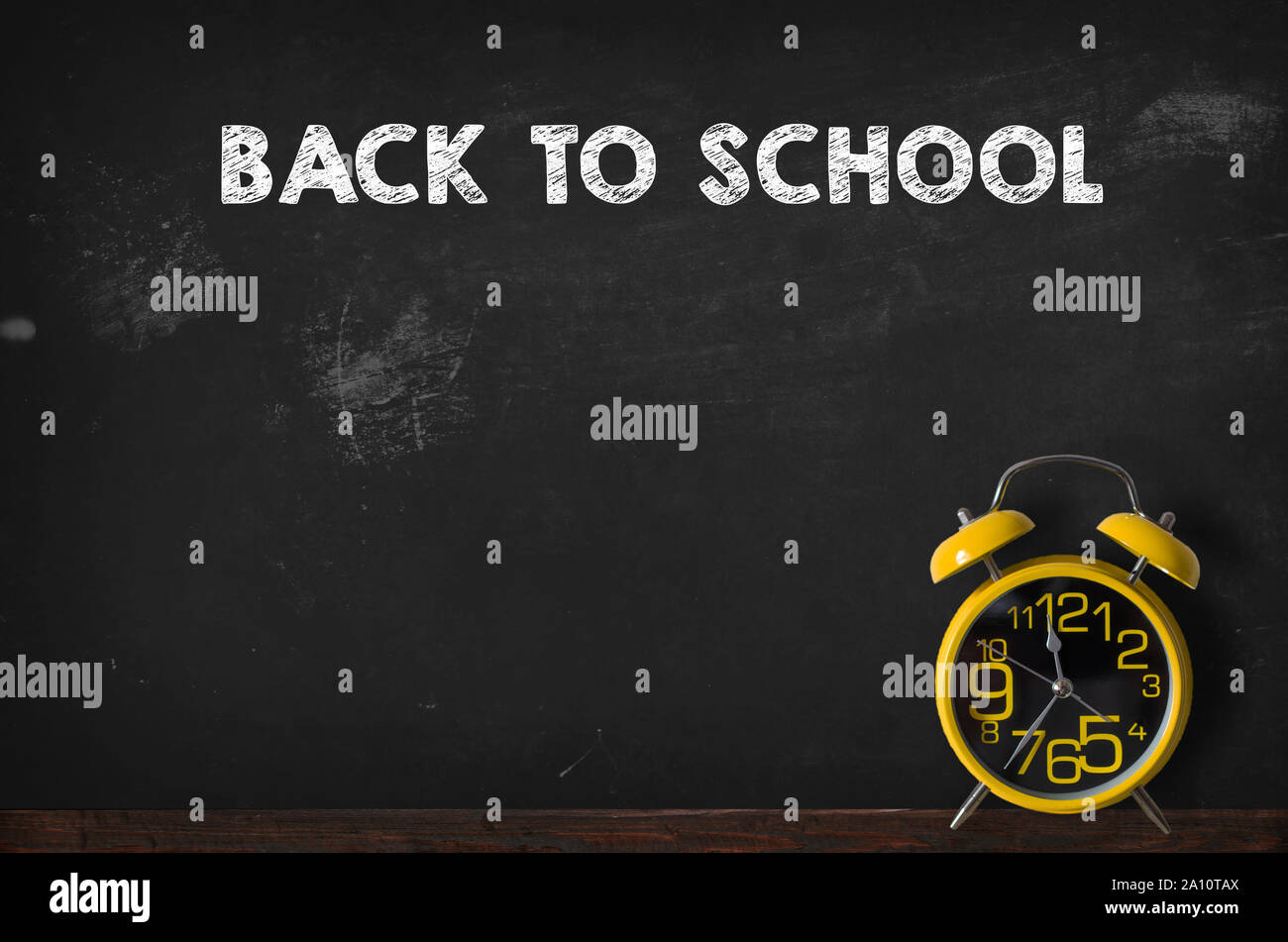 Back to school blackboard with clock, background Stock Photo