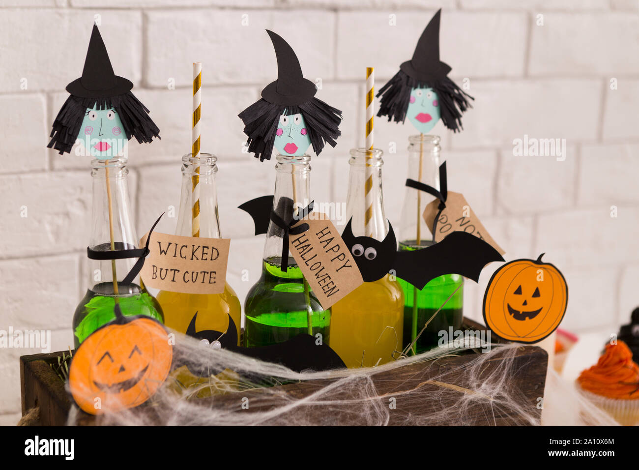 Halloween drinks with witches head preparing for scared night Stock Photo