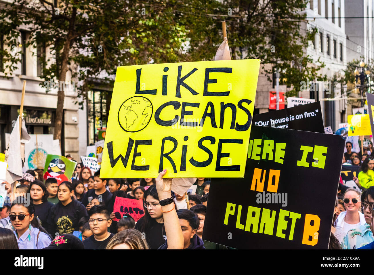 Sep 20, 2019 San Francisco / CA / USA - Like Oceans We Rise placard raised at the Global Youth Climate Strike Rally and March in downtown San Francisc Stock Photo