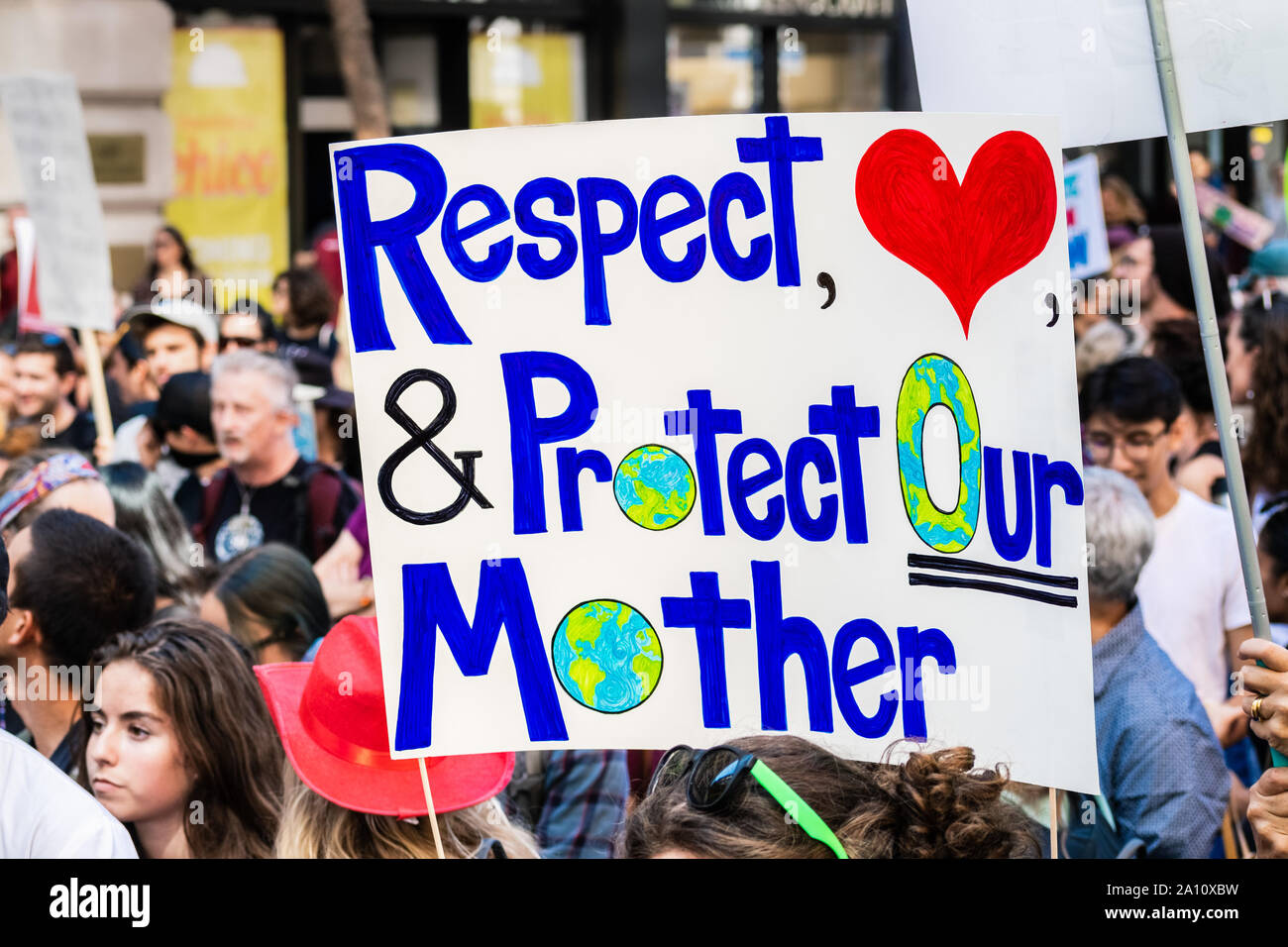 Sep 20, 2019 San Francisco / CA / USA - Respect & protect our mother placard raised at the Global Youth Climate Strike Rally and March in downtown San Stock Photo