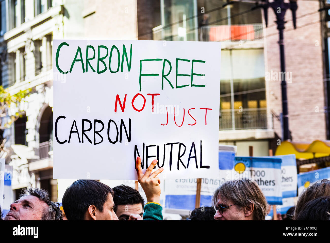Sep 20, 2019 San Francisco / CA / USA - Carbon Free not just Carbon Neutral placard raised at the Global Youth Climate Strike Rally and March in downt Stock Photo
