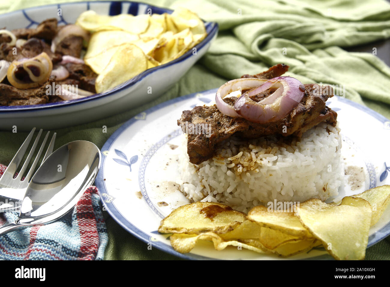 Freshly cooked Filipino food called Bistek Tagalog or fried pork