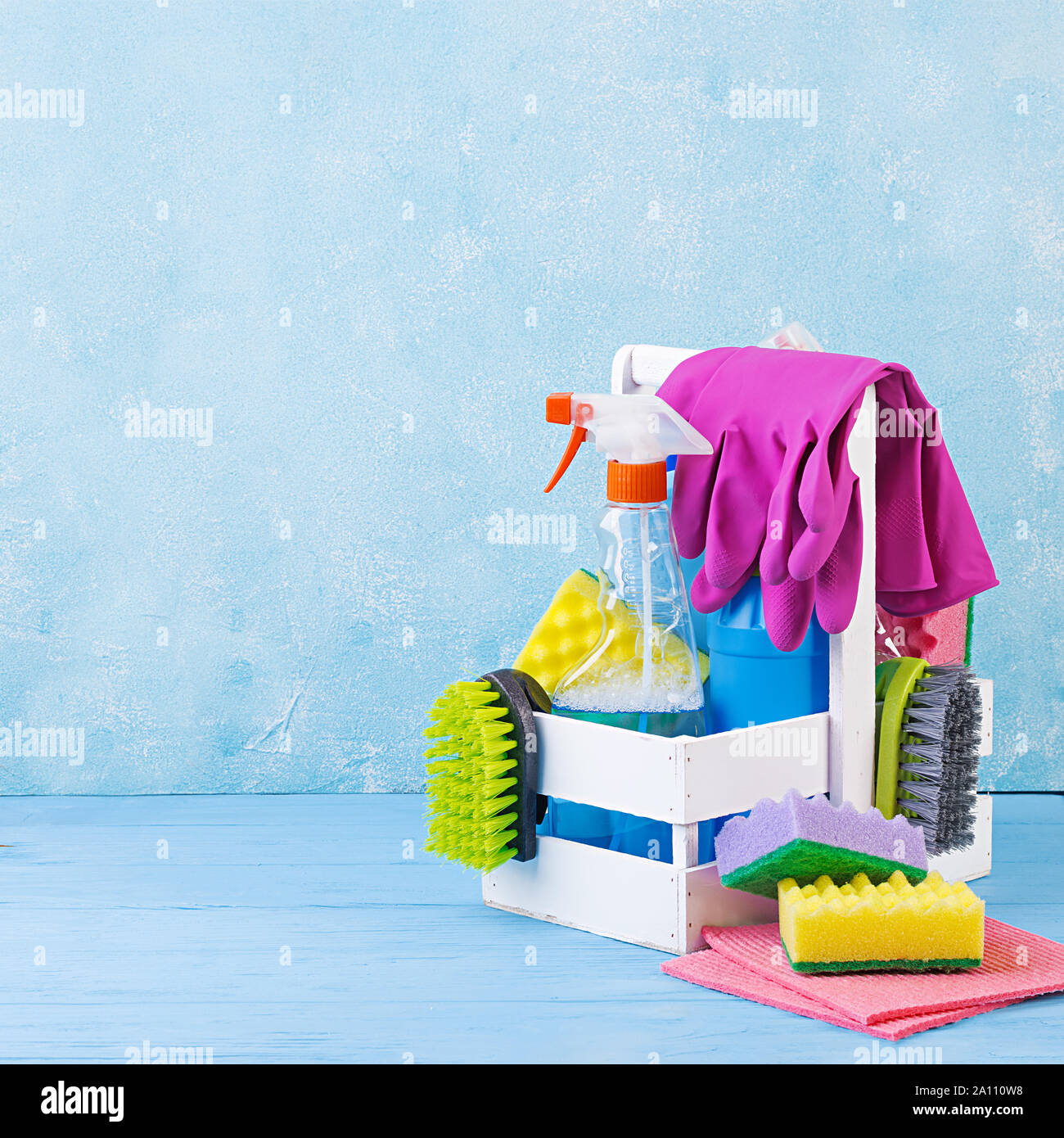 https://c8.alamy.com/comp/2A110W8/cleaning-service-concept-colorful-cleaning-set-for-different-surfaces-in-kitchen-bathroom-and-other-rooms-2A110W8.jpg