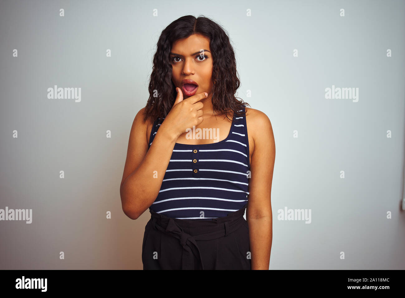 Transsexual transgender woman wearing striped t-shirt over isolated white  background Looking fascinated with disbelief, surprise and amazed  expression Stock Photo - Alamy