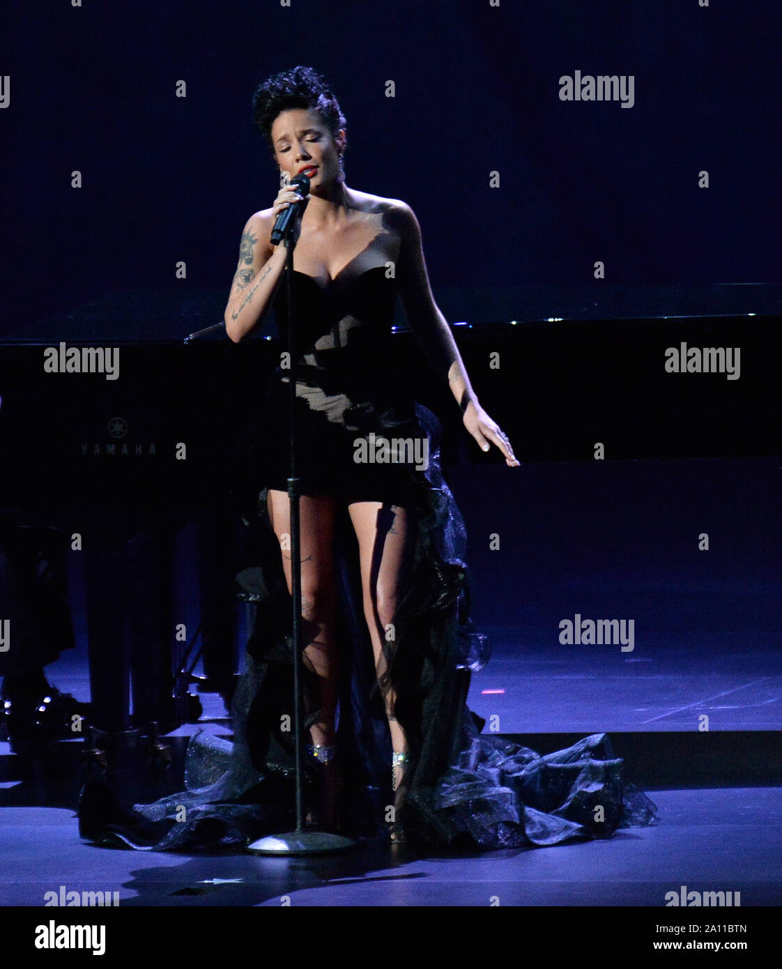 Halsey performs a piano rendition of the Cyndi Lauper classic 'Time After Time,' over a presentation of television entertainers who had passed away earlier this year during the 71st annual Emmy Awards at the Microsoft Theater in downtown Los Angeles on Sunday, September 22, 2019. Photo by Jim Ruymen/UPI Stock Photo